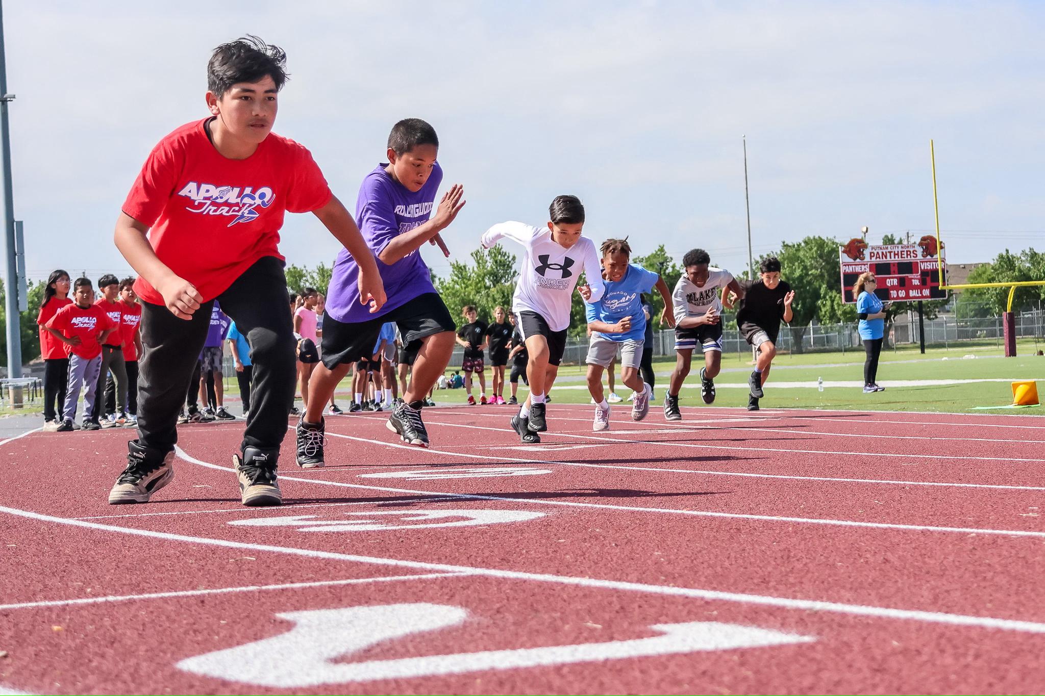 Kids Running on Track